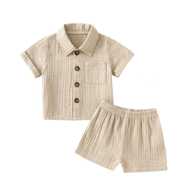 Solid short sleeve pocket button down lapel shirt and shorts set for babies in white, blue, and beige. Soft breathable fabric ideal for toddlers.