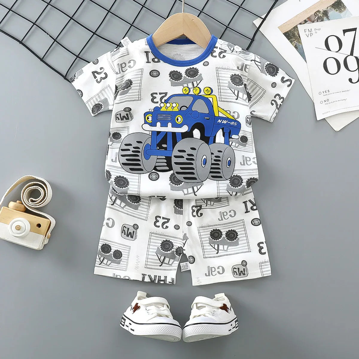 Kids Clothes 2 Piece Set - Cartoon Casual Kids featuring Donald Duck print, yellow t-shirt and blue shorts, ideal for playful comfort and style.
