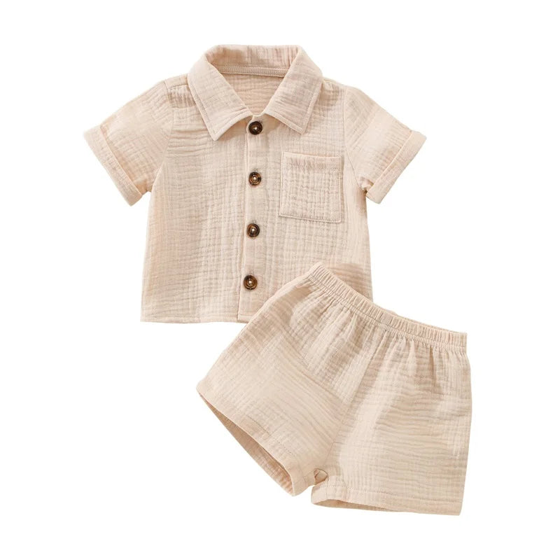 Solid short sleeve pocket button down lapel shirt and shorts set for babies in white, blue, and beige. Soft breathable fabric ideal for toddlers.