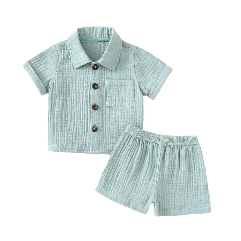 Solid short sleeve pocket button down lapel shirt and shorts set for babies in white, blue, and beige. Soft breathable fabric ideal for toddlers.