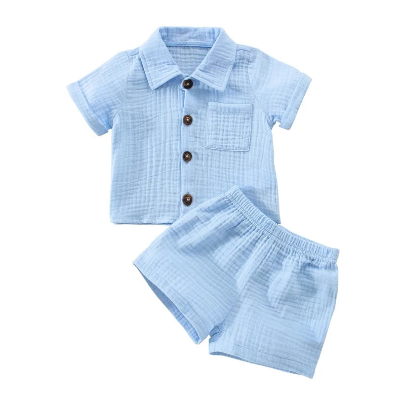 Solid short sleeve pocket button down lapel shirt and shorts set for babies in white, blue, and beige. Soft breathable fabric ideal for toddlers.