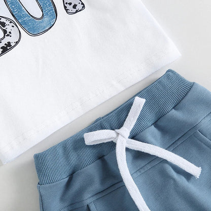 Cotton Short Sleeve Print T-shirts + Elastic Shorts set for toddlers featuring 'Mama's Boy' text and blue drawstring shorts. Ideal for 0-3 years.