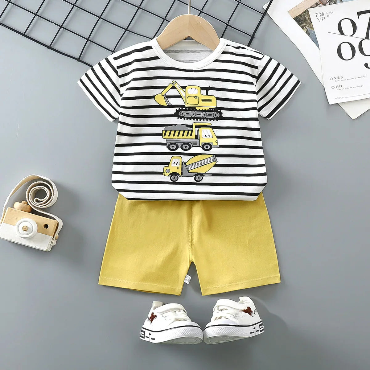 Kids Clothes 2 Piece Set - Cartoon Casual Kids featuring Donald Duck print, yellow t-shirt and blue shorts, ideal for playful comfort and style.
