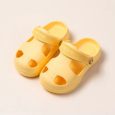 Non-slip soft beach sandals in yellow, teal, pink, and mint green with breathable hole design, ideal for summer wear for men and women.