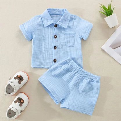 Solid short sleeve pocket button down lapel shirt and shorts set for babies in white, blue, and beige. Soft breathable fabric ideal for toddlers.
