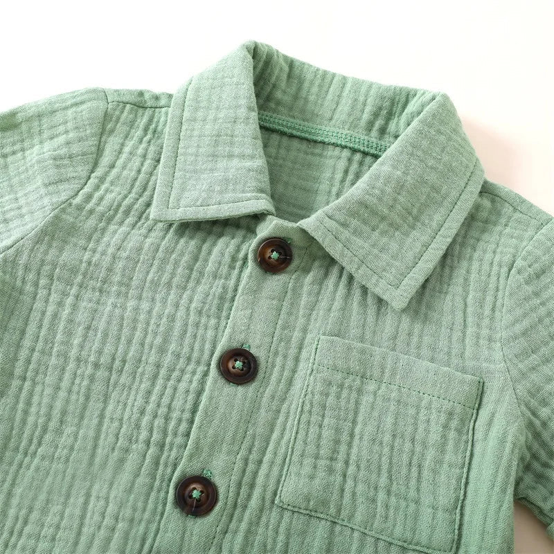 Solid short sleeve pocket button down lapel shirt and shorts set for babies in white, blue, and beige. Soft breathable fabric ideal for toddlers.