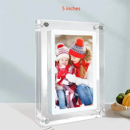 Acrylic Photo Frame - Type C Video Upload displays a winter photo of a mother and child. Clear digital frame with 480x854 IPS screen for vivid playback.