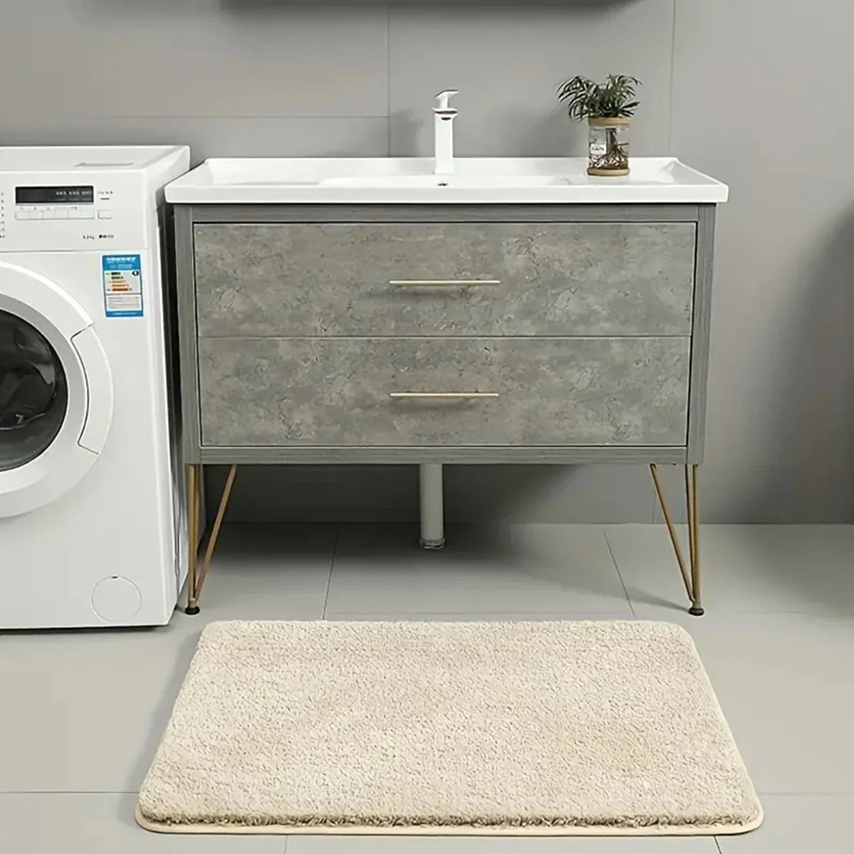 Anti-slip Bathroom Floor Mat in gray with plush texture, shown under bare feet for comfort and safety on wet bathroom floors.