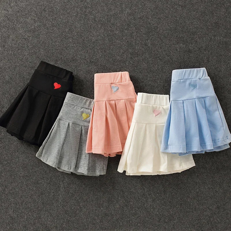 Uniform Culottes Skirts - Pleated All-Match in gray, black, white, pink, and blue with heart embroidery. Stylish and versatile for school or work.