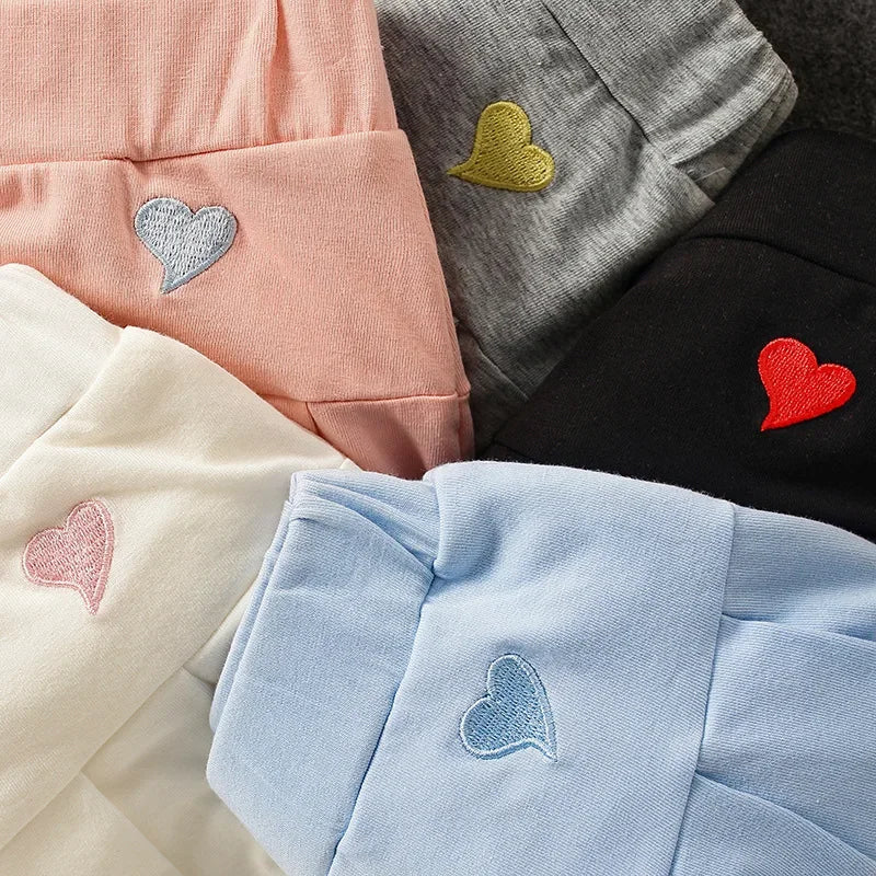 Uniform Culottes Skirts - Pleated All-Match in gray, black, white, pink, and blue with heart embroidery. Stylish and versatile for school or work.