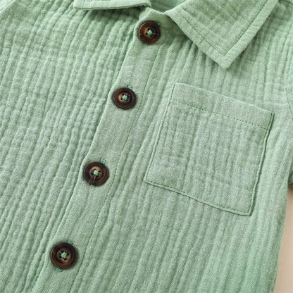 Solid short sleeve pocket button down lapel shirt and shorts set for babies in white, blue, and beige. Soft breathable fabric ideal for toddlers.
