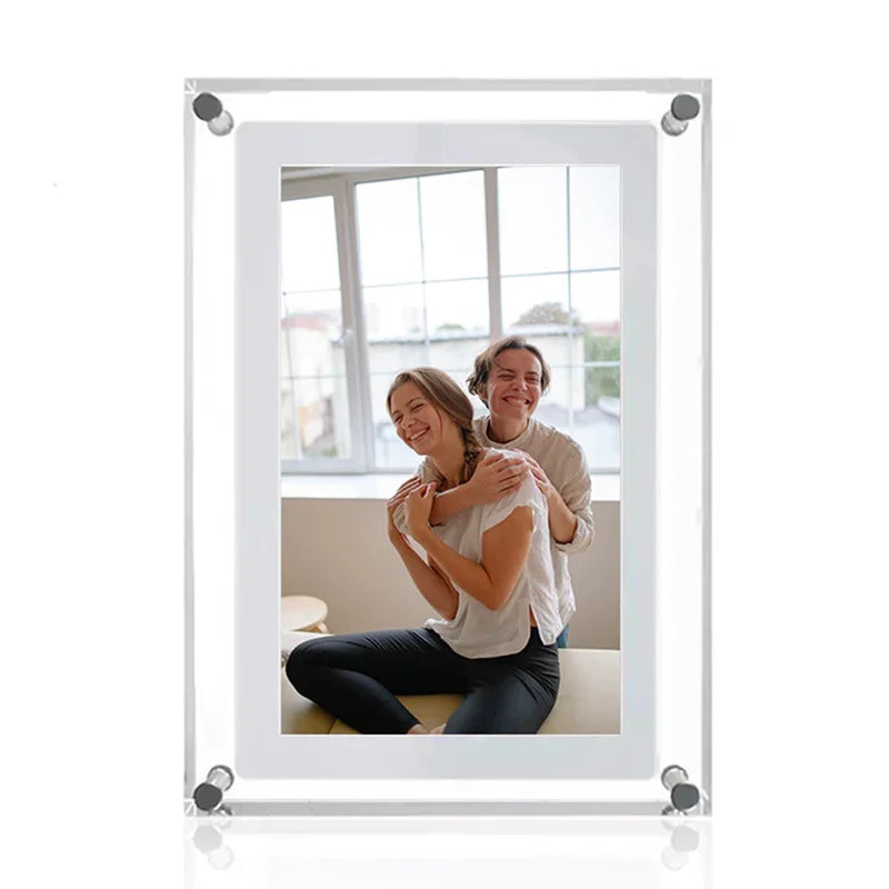 Acrylic Photo Frame - Type C Video Upload displays a winter photo of a mother and child. Clear digital frame with 480x854 IPS screen for vivid playback.