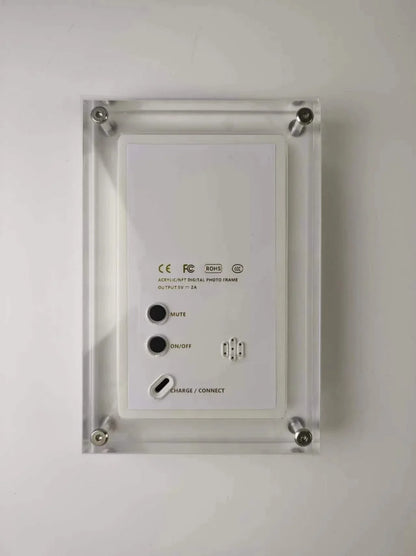 Acrylic Photo Frame - Type C Video Upload displays a winter photo of a mother and child. Clear digital frame with 480x854 IPS screen for vivid playback.