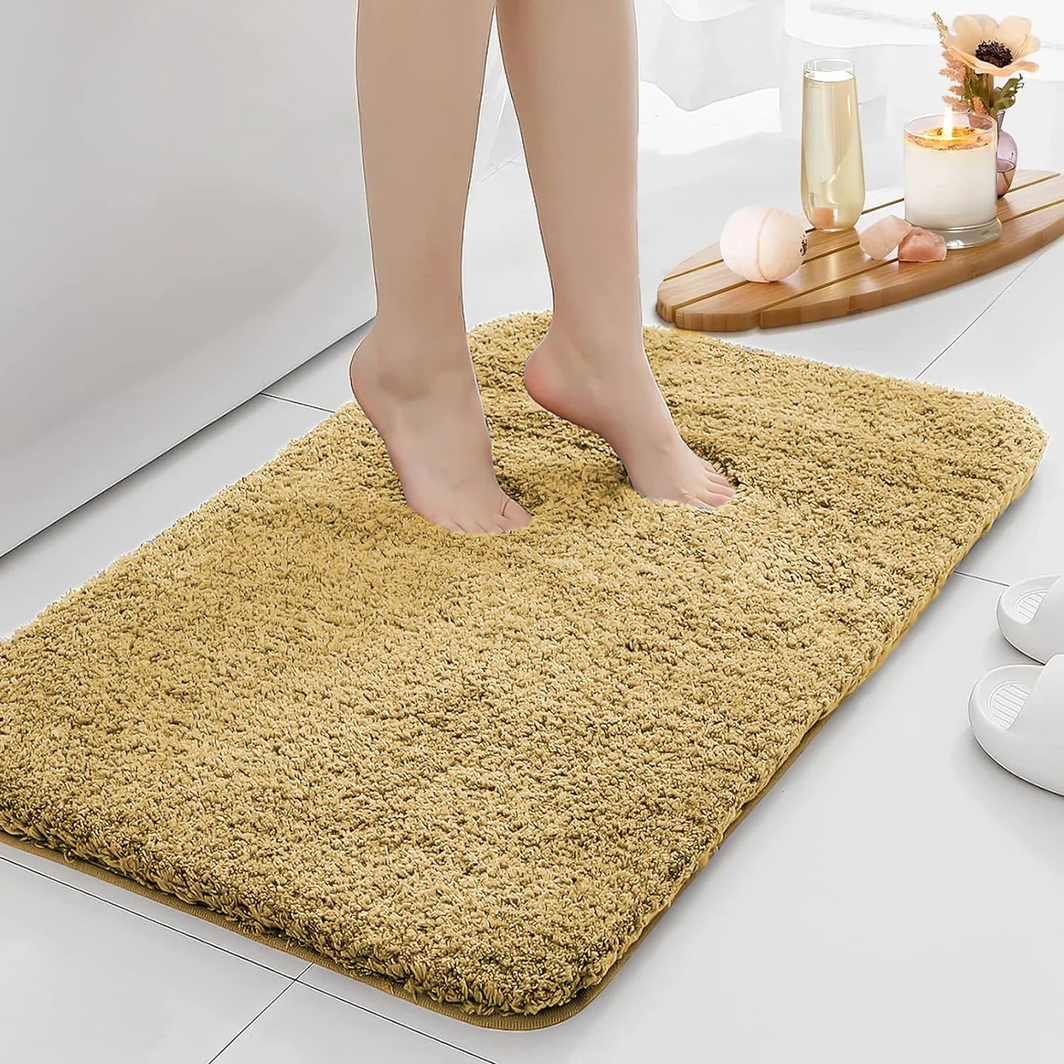Anti-slip Bathroom Floor Mat in gray with plush texture, shown under bare feet for comfort and safety on wet bathroom floors.