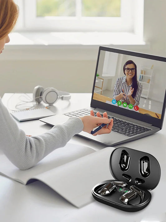 3-in-1 AI Translator Earbuds with wireless charging case shown on desk during a video call. Ideal for real-time translation and noise-cancelling use.