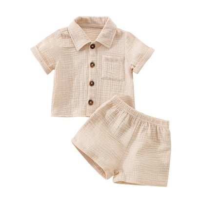 Solid short sleeve pocket button down lapel shirt and shorts set for babies in white, blue, and beige. Soft breathable fabric ideal for toddlers.