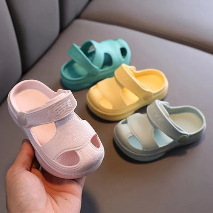 Non-slip soft beach sandals in yellow, teal, pink, and mint green with breathable hole design, ideal for summer wear for men and women.