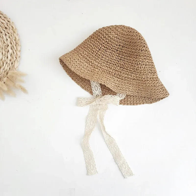 Summer Straw Bow Lace Baby Hat in beige and brown with lace chin ties, ideal for 0-3 years old with 44-54 cm head circumference.