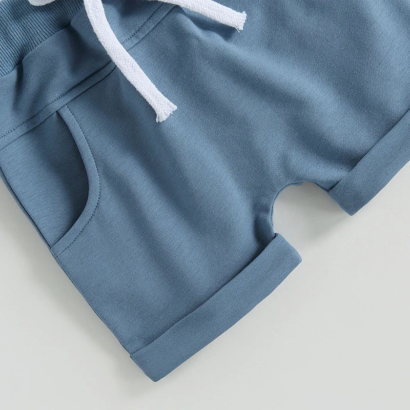 Cotton Short Sleeve Print T-shirts + Elastic Shorts set for toddlers featuring 'Mama's Boy' text and blue drawstring shorts. Ideal for 0-3 years.