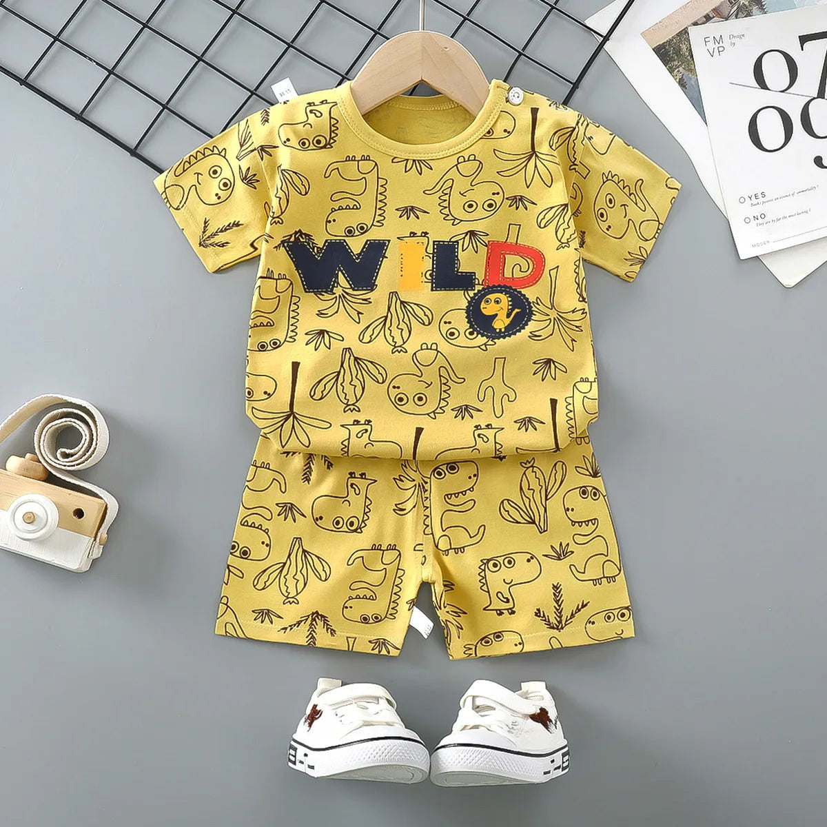 Kids Clothes 2 Piece Set - Cartoon Casual Kids featuring Donald Duck print, yellow t-shirt and blue shorts, ideal for playful comfort and style.